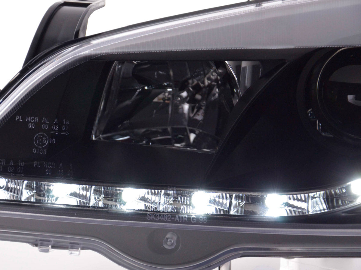 Scheinwerfer Set Daylight LED Tagfahrlicht Opel Astra G 98-03 schwarz Scheinwerfer Set Daylight LED Tagfahrlicht Opel Astra G 98-03 schwarz